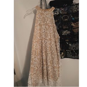 White choker lace dress with tan slip underneath